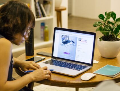 woman browsing on her laptop